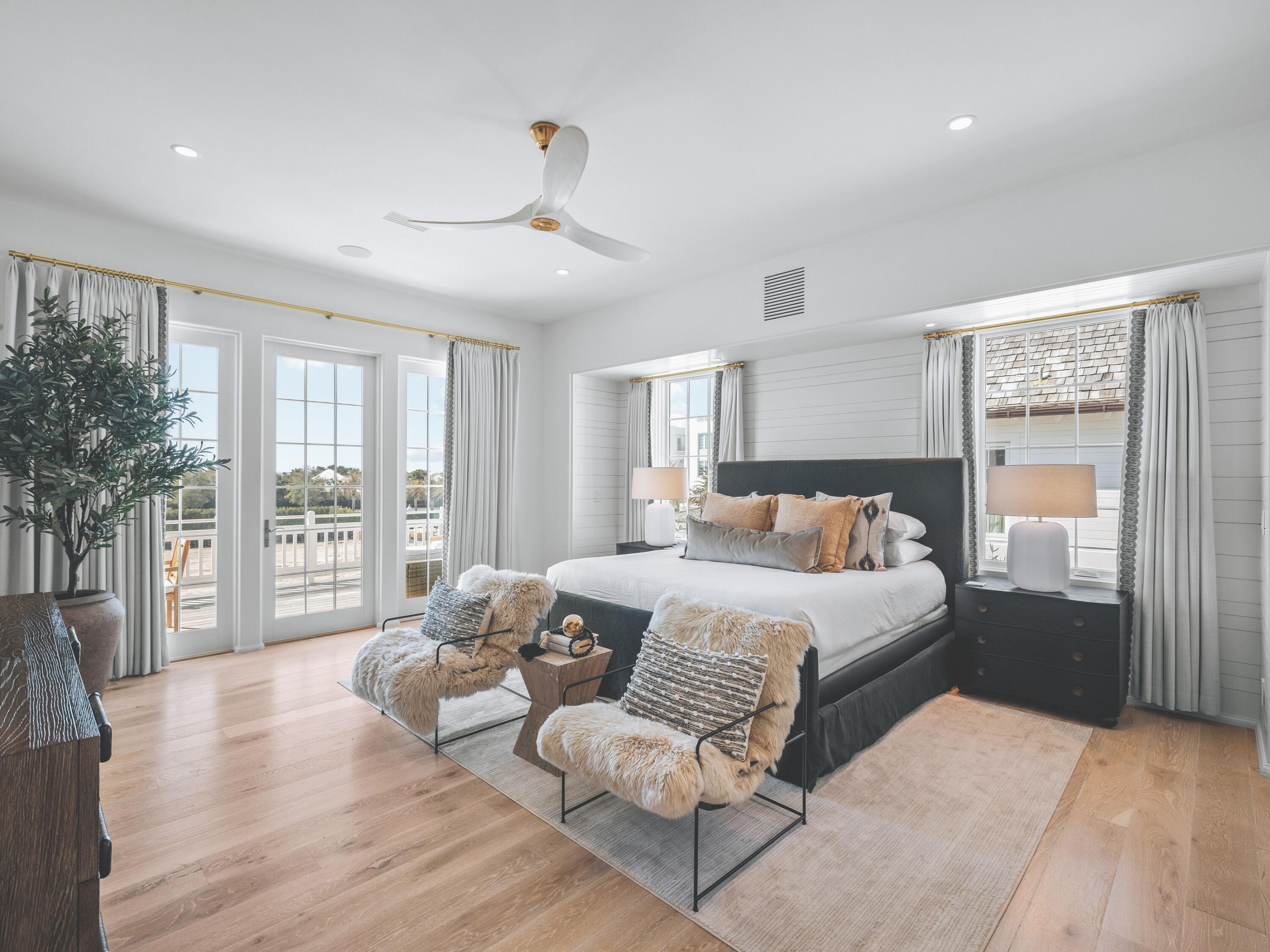 19 Astra Way Inlet Beach, Unit 11 Inlet Beach, FL 32461 - Photo 4 of 42 a spacious bedroom with a bed and a large window