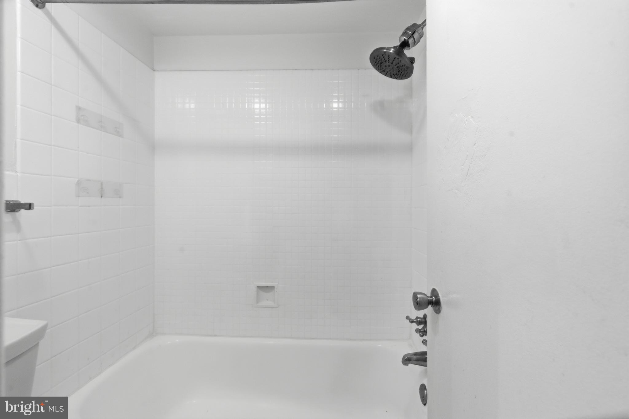 1440 Northwest N Street Northwest, Unit 404 Washington, DC 20005 - Photo 18 of 24 a close up of a bathtub