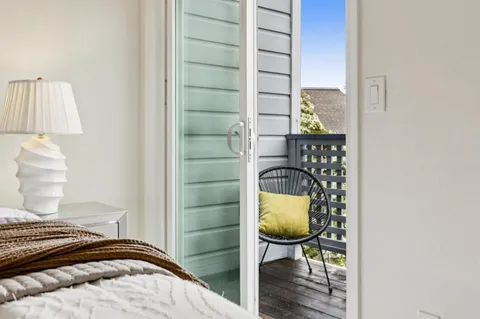 a bedroom with a bed and a fireplace