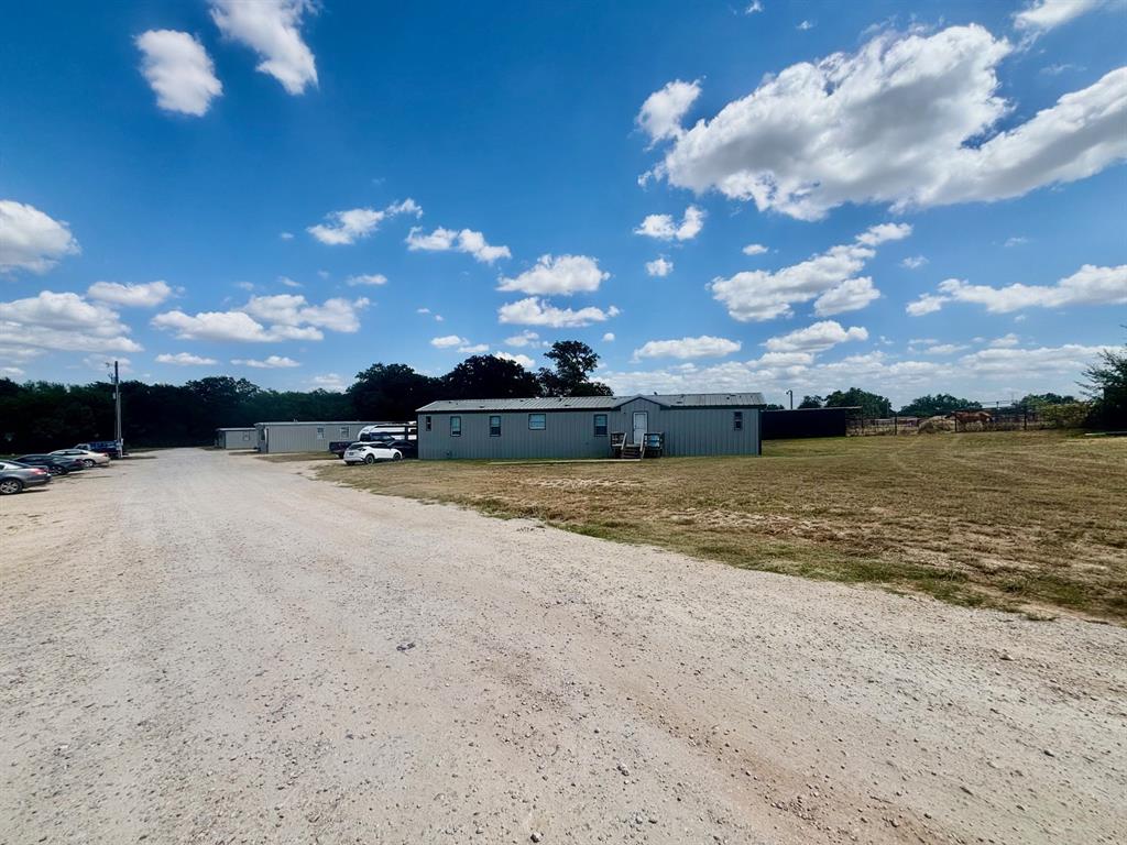 392 Tbd County Road Stephenville, TX 76401 - Photo 8 of 18 a view of a house with a yard