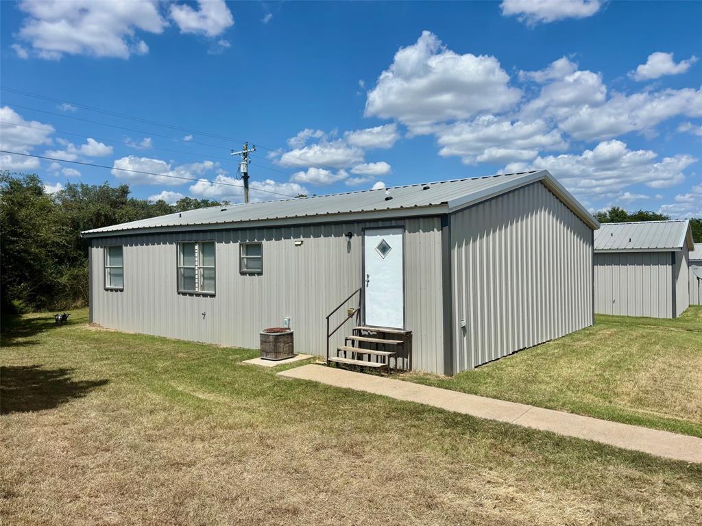 392 Tbd County Road Stephenville, TX 76401 - Photo 9 of 18 a view of a house with backyard and a tree