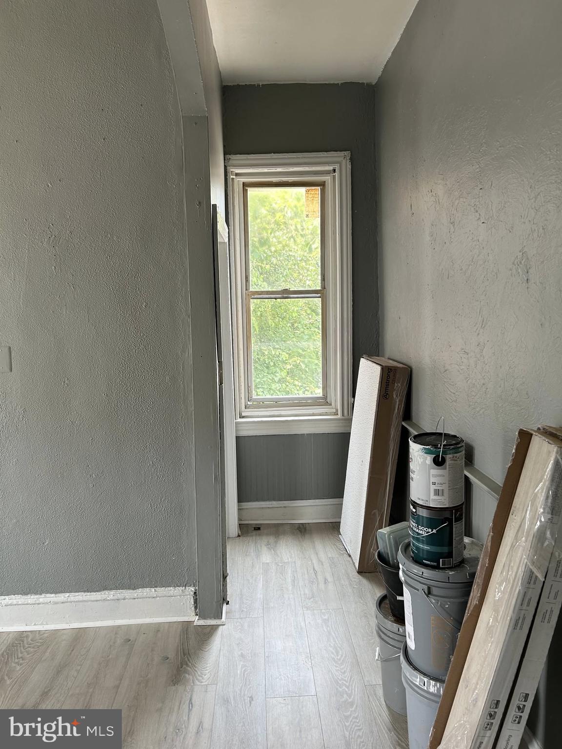 3612 North 5th Street Philadelphia, PA 19140 - Photo 7 of 9 a view of a workspace with furniture and a window