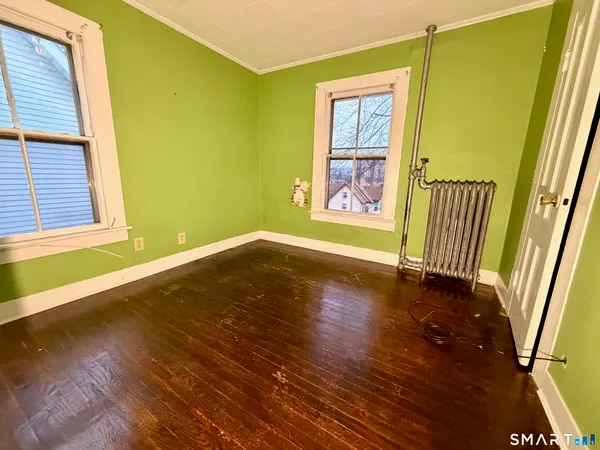 a view of a bedroom with closet