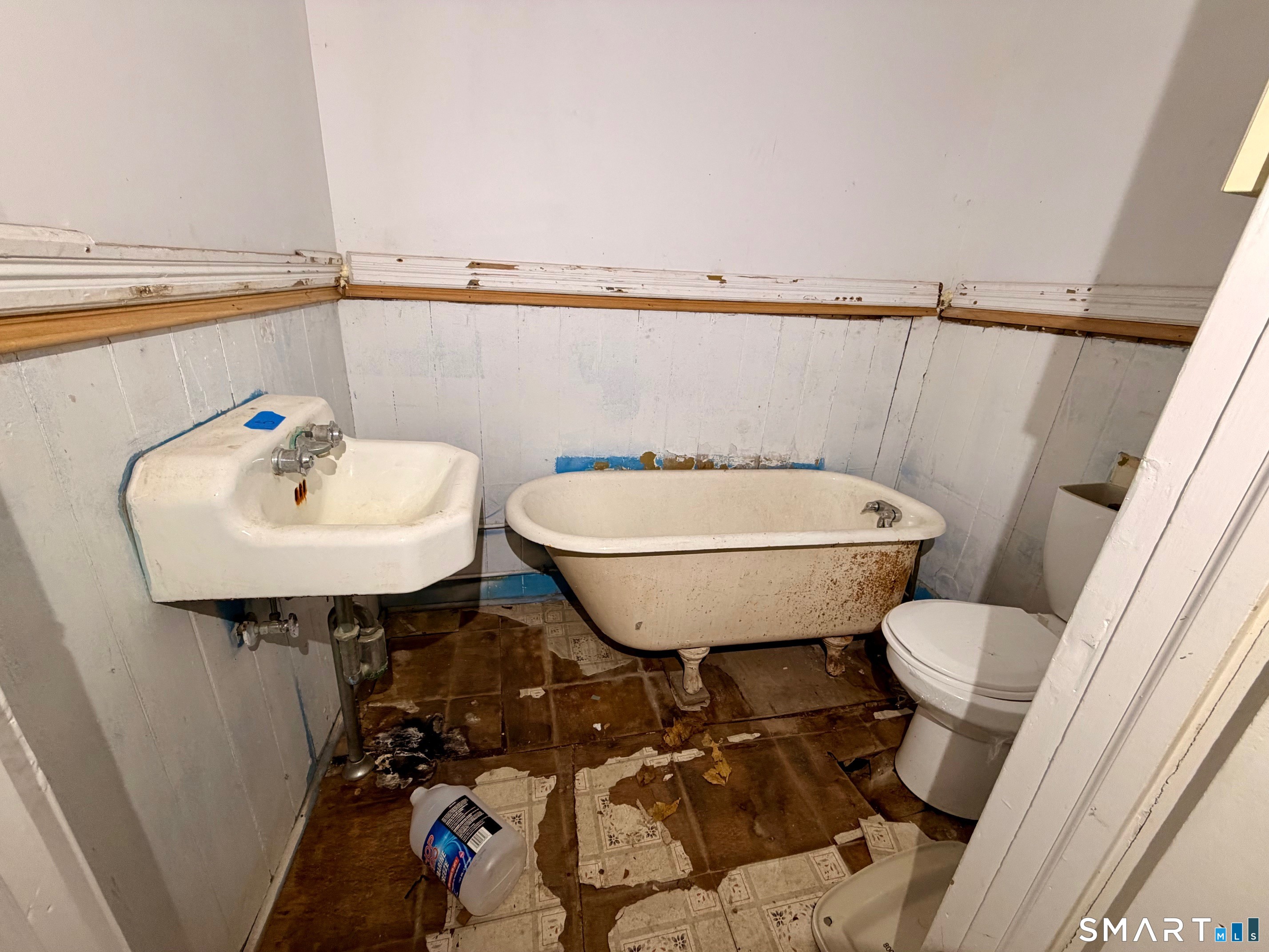 86 Linsley Avenue Meriden, CT 06451 - Photo 16 of 24 a bathroom with a sink toilet and a mirror