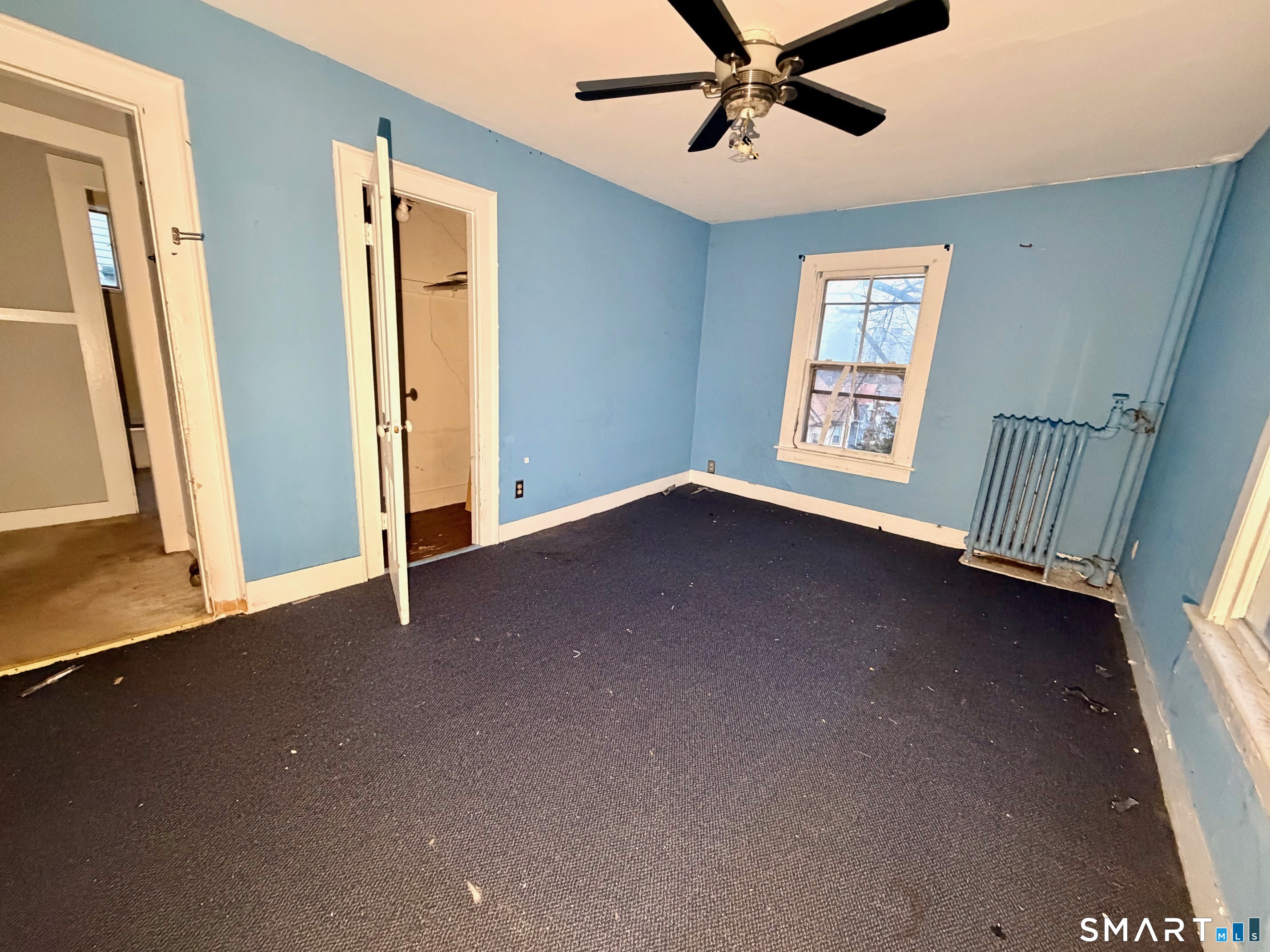 86 Linsley Avenue Meriden, CT 06451 - Photo 10 of 24 a view of an empty room with a window