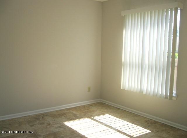 205-3 Long Bridge Road St. Johns, FL 32259 - Photo 12 of 30 wooden floor in an empty room with a window