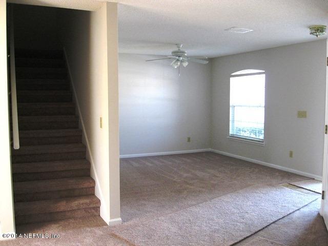 205-3 Long Bridge Road St. Johns, FL 32259 - Photo 4 of 30 a view of an empty room with a window