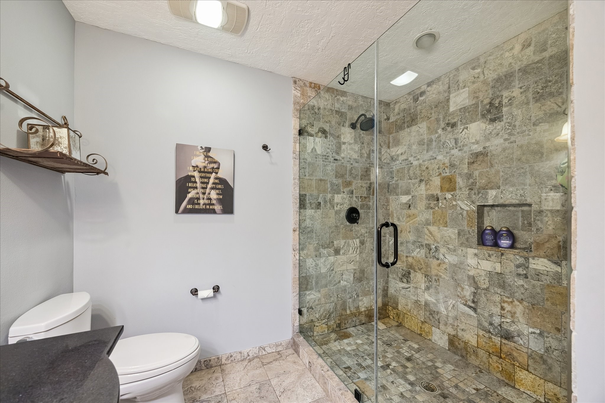 4520 Dickson Street Houston, TX 77007 - Photo 15 of 25 Large walk in shower in the primary bathroom with dual shower heads.