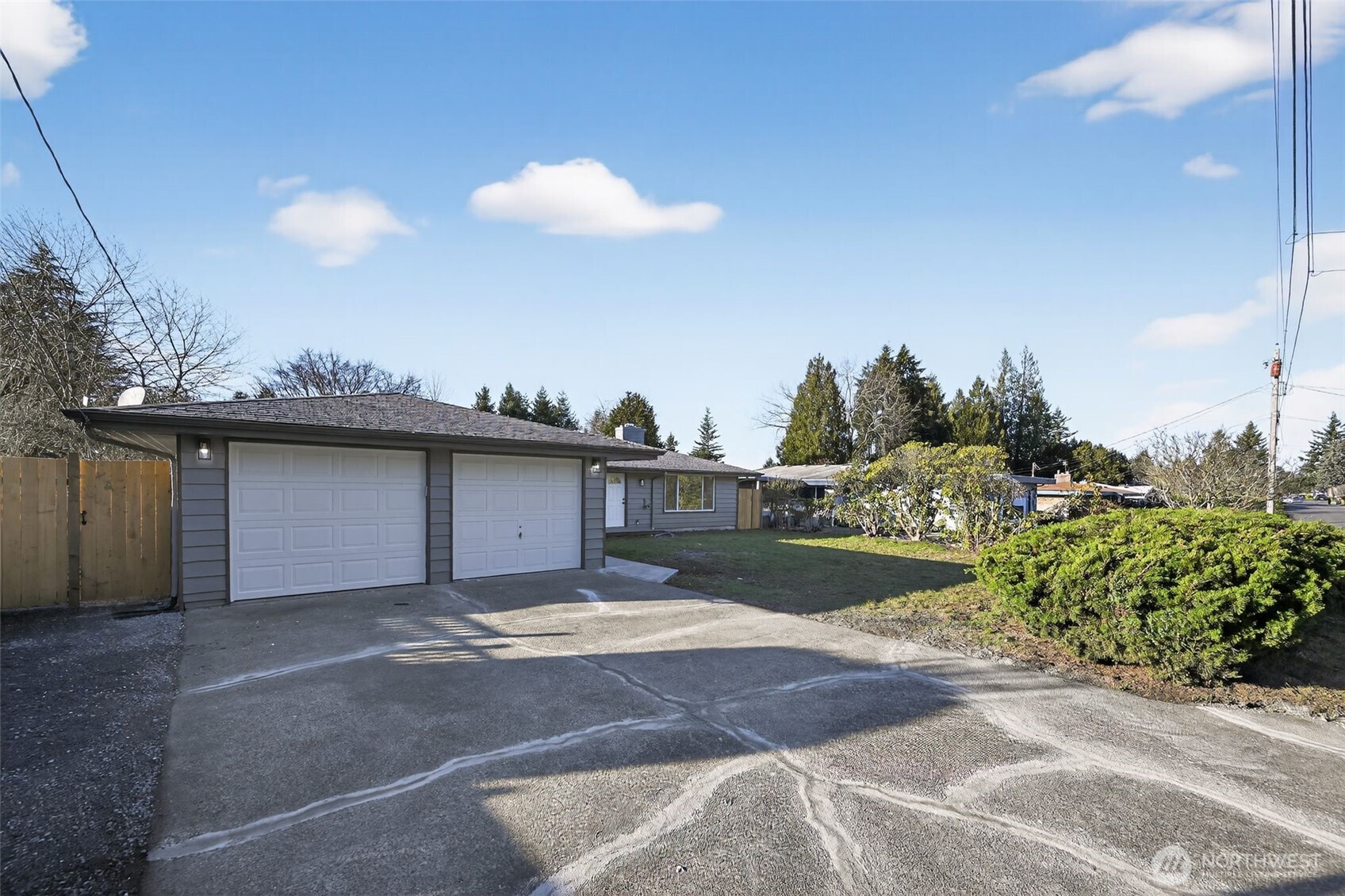 17843 110th Avenue Southeast Renton, WA 98055 - Photo 1 of 31 a view of a house with a yard and potted plants