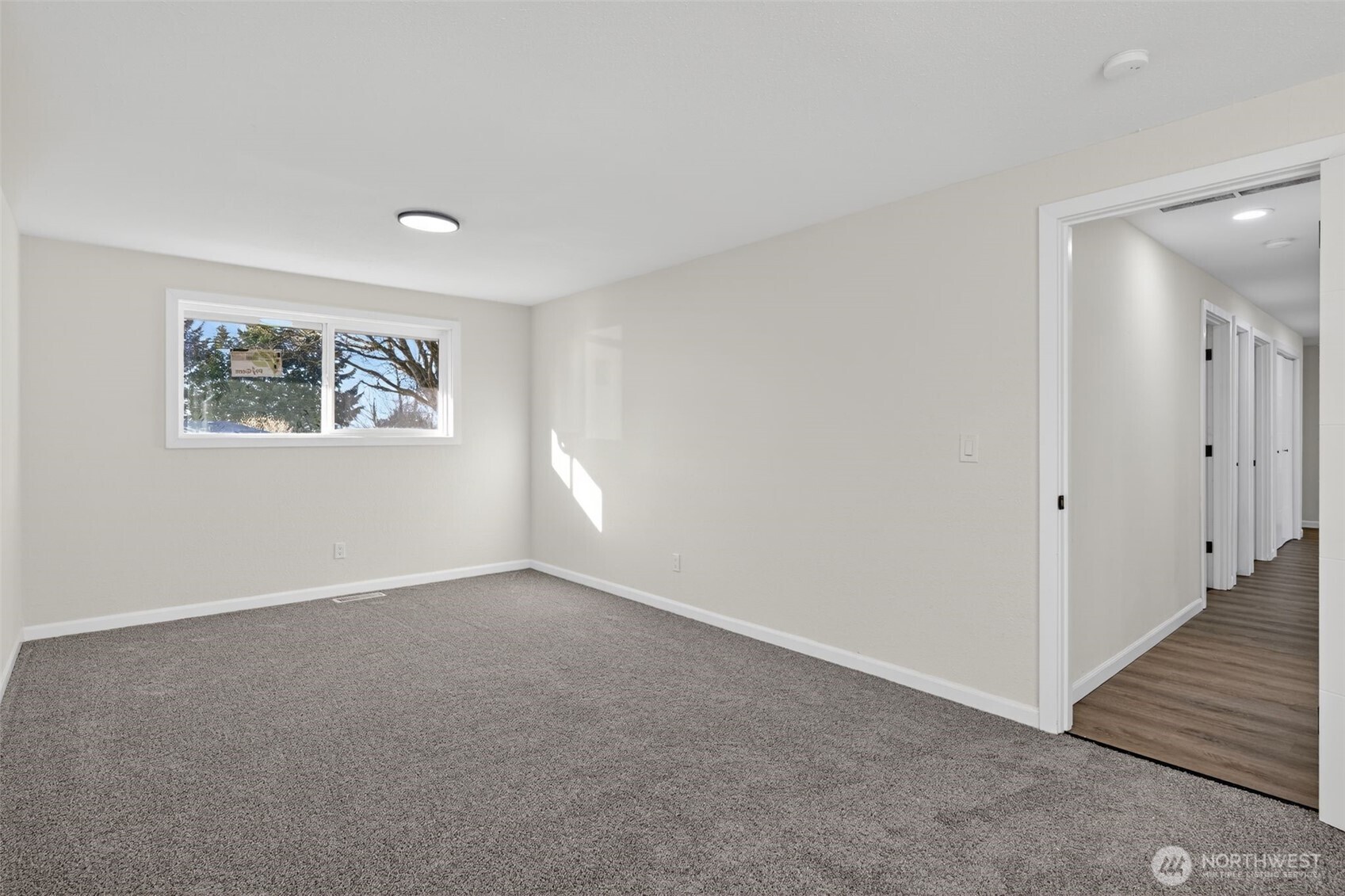 17843 110th Avenue Southeast Renton, WA 98055 - Photo 15 of 31 a view of an empty room with a window
