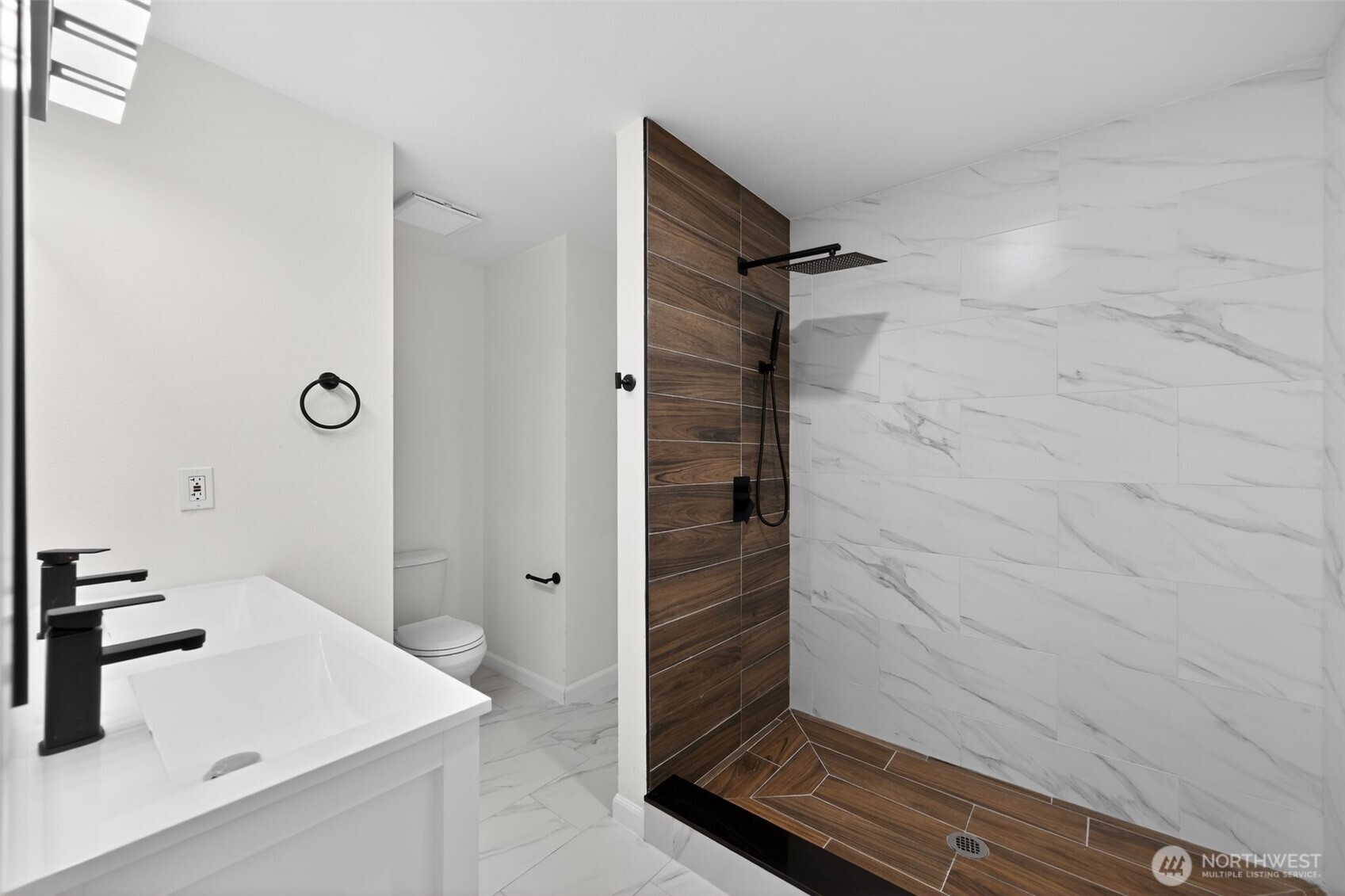 17843 110th Avenue Southeast Renton, WA 98055 - Photo 17 of 31 a bathroom with a sink and a mirror