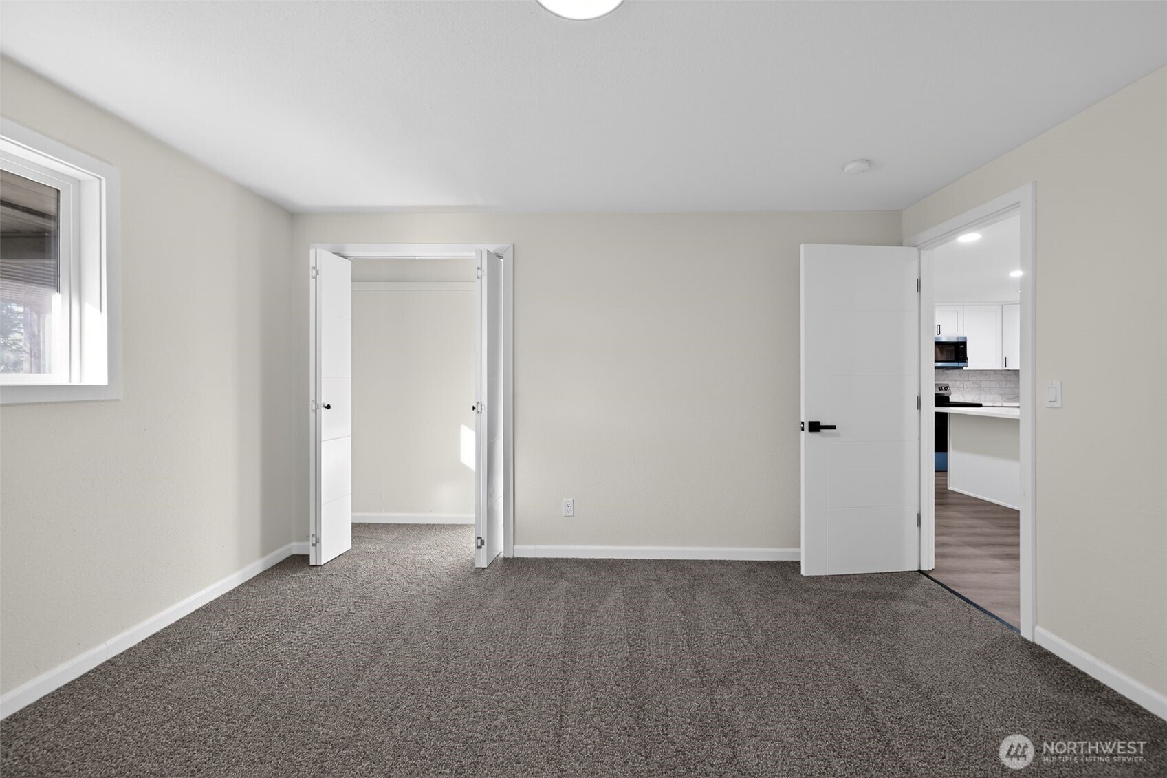 17843 110th Avenue Southeast Renton, WA 98055 - Photo 27 of 31 a view of an empty room with a window