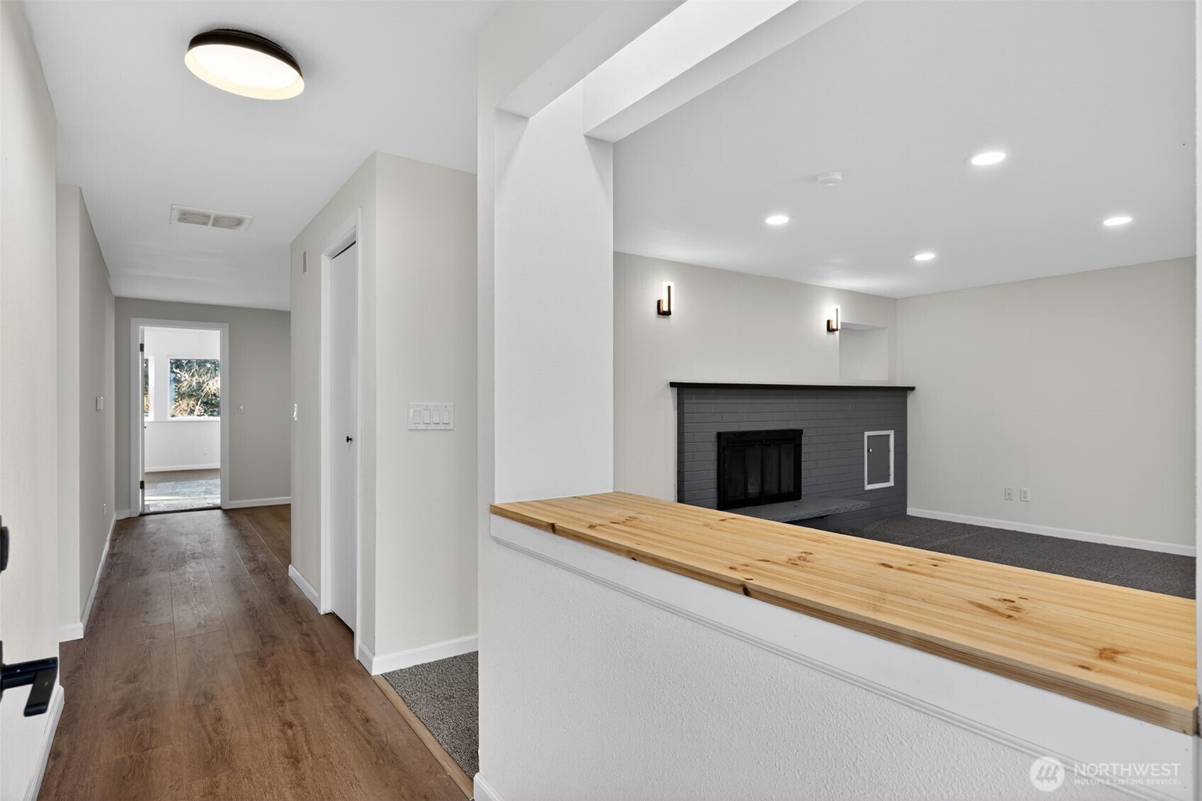 17843 110th Avenue Southeast Renton, WA 98055 - Photo 28 of 31 a view of an empty room and wooden floor