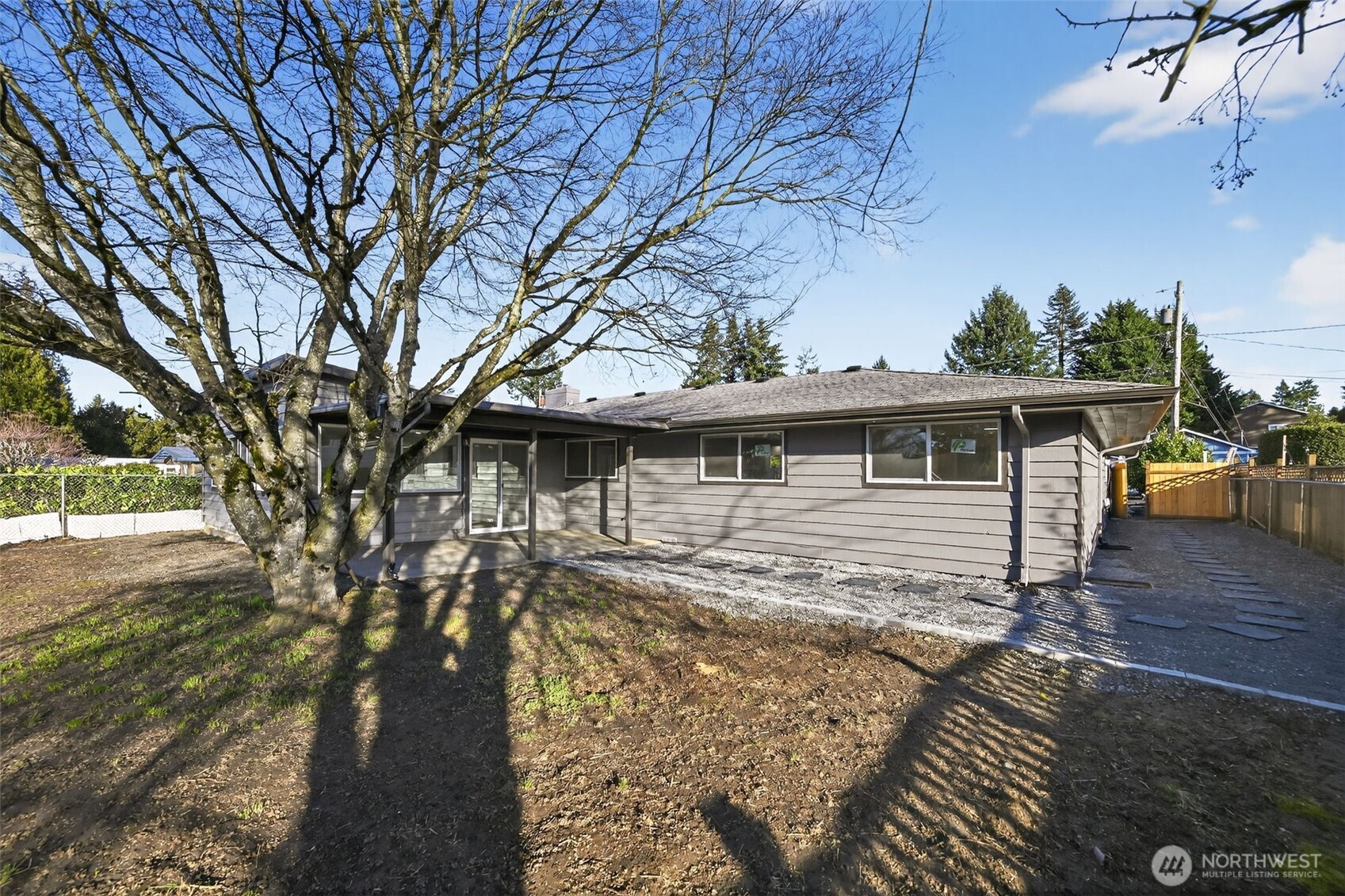 17843 110th Avenue Southeast Renton, WA 98055 - Photo 3 of 31 a front view of house with yard and trees around
