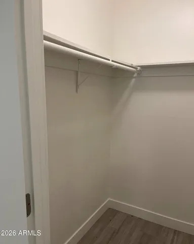 a view of an empty walk in closet