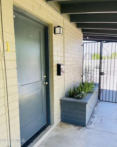 a view of a entryway door front of house