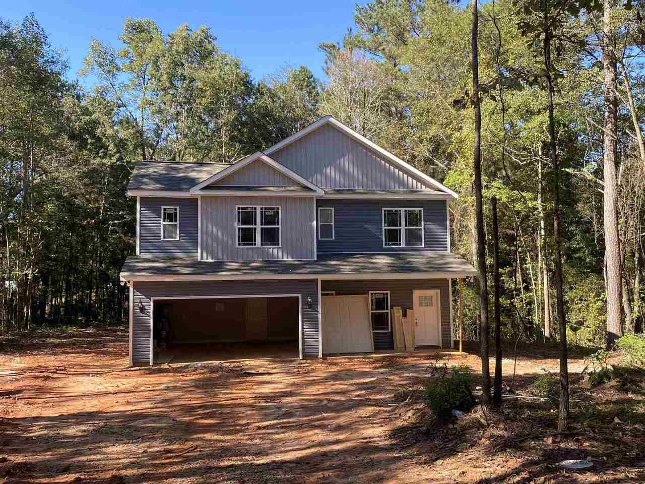 459 Martin Dairy Road Milner, GA 30257 - Photo 1 of 1 a front view of a house with a yard