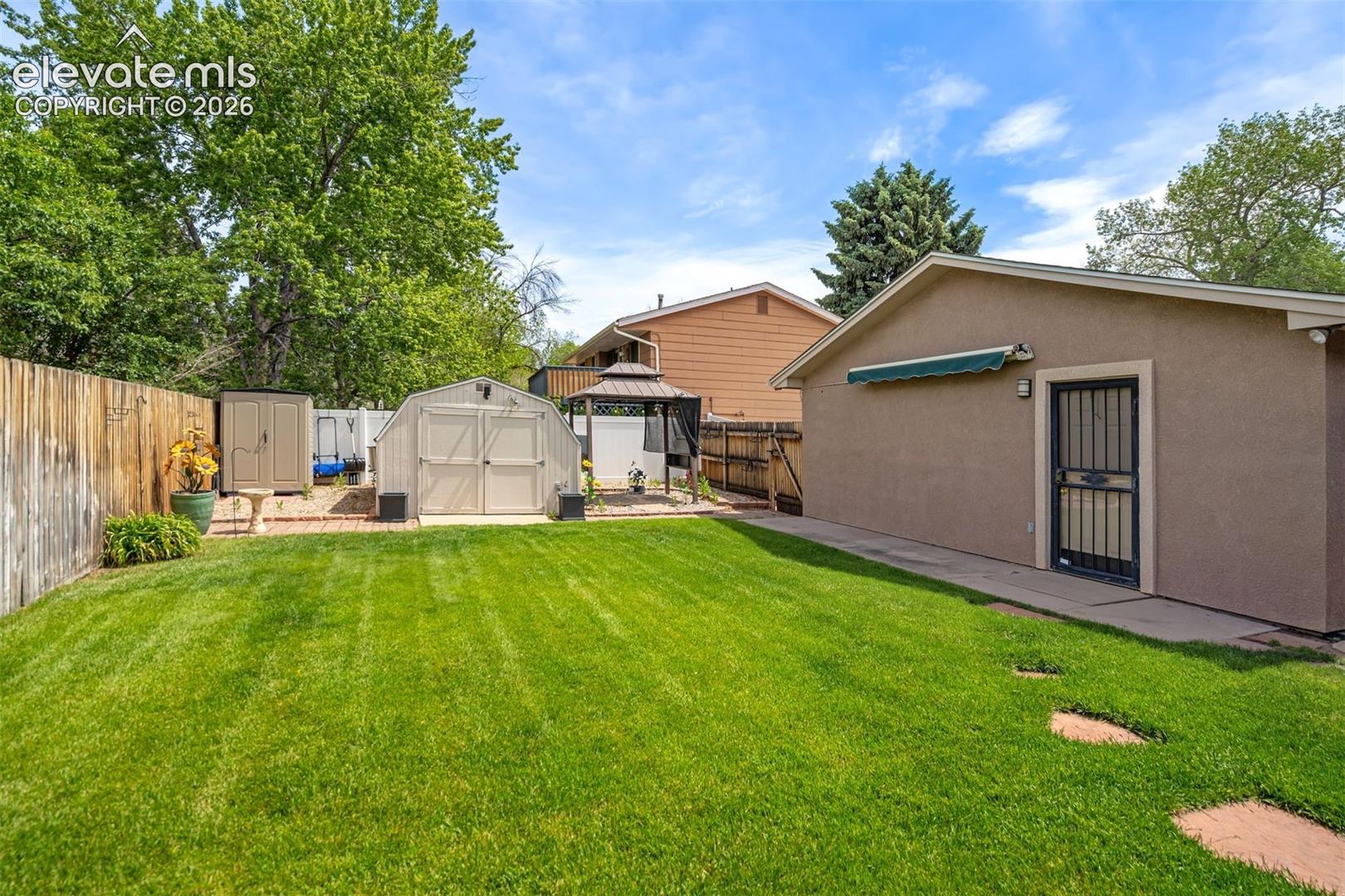 2814 Ridgeglen Place Colorado Springs, CO 80918 - Photo 40 of 50 Lush Green Backyard