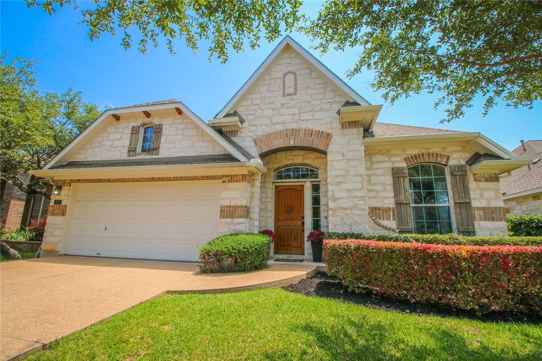 310 Longhorn Ridge Road Cedar Park, TX 78613 - Photo 1 of 1 a front view of a house with a yard