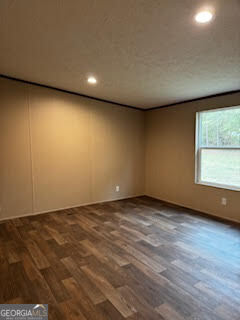 21 Trailer Park Road Hartwell, GA 30643 - Photo 2 of 11 a view of an empty room with a window