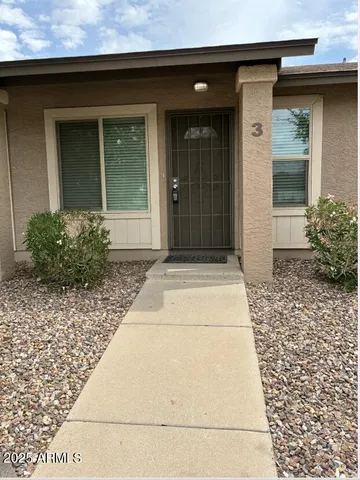 a entrance to house with yard