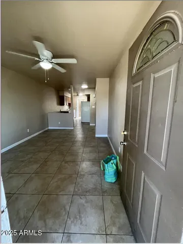 a view of a hallway with a chandelier