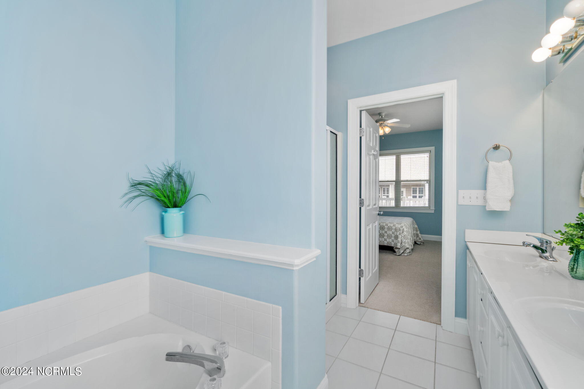 1701 Salter Path Road, Unit D301 Indian Beach, NC 28512 - Photo 21 of 60 En suite primary bathroom