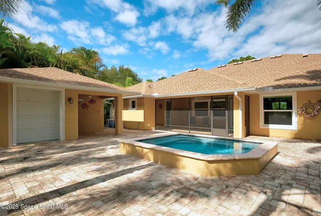 a view of a park with large trees