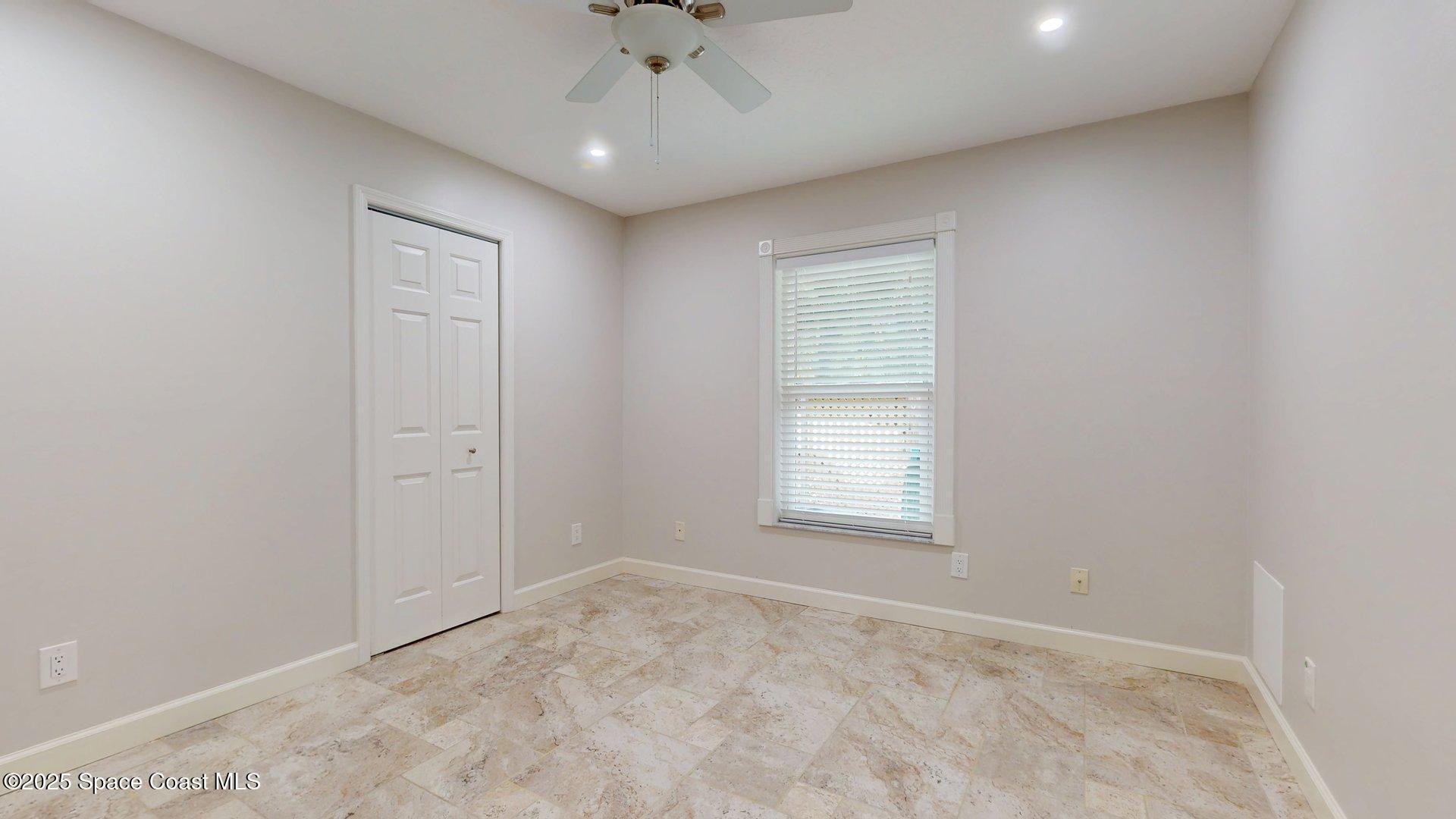 4580 Hunters Run Circle Grant, FL 32949 - Photo 50 of 55 an empty room with a window