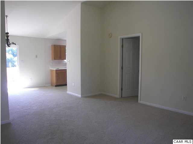 609 East Daffodil Road Ruckersville, VA 22968 - Photo 3 of 12 a view of empty room with kitchen