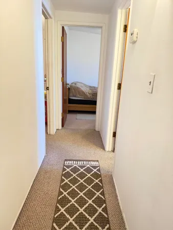 a bathroom with a sink mirror and vanity