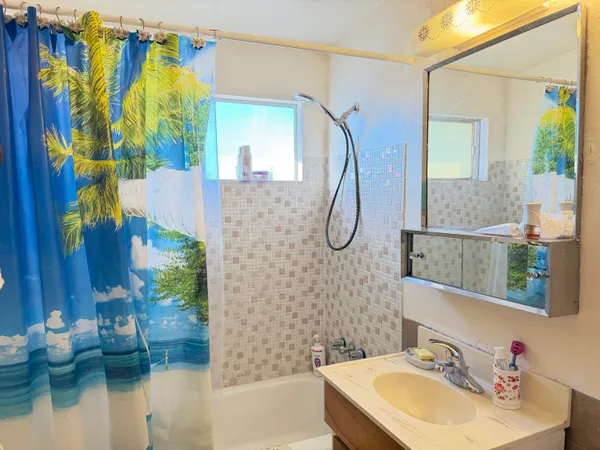 a bedroom with a bed and a chair