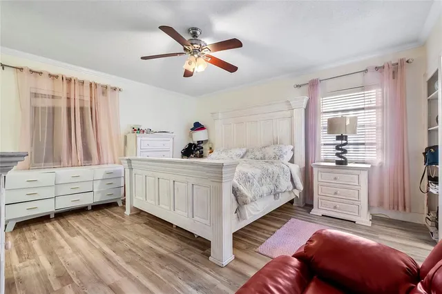 a bedroom with furniture and white walls