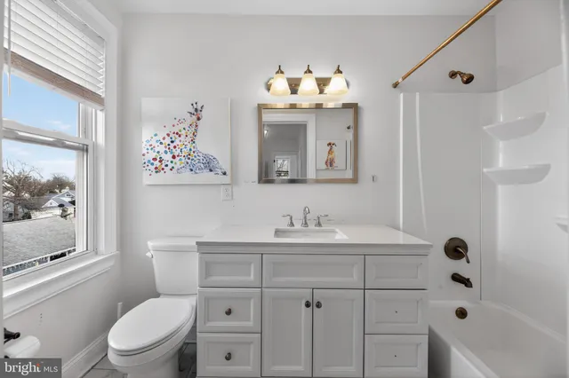 a view of a bedroom with walk in closet