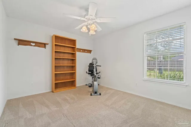 a view of room with stairs and a window