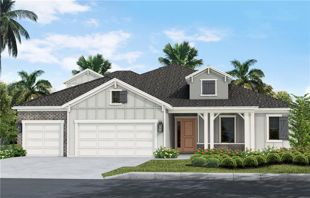 4423 Fly Rod Terrace Parrish, FL 34219 - Photo 1 of 1 a front view of a house with a garden
