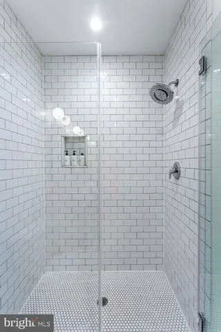 a bathroom with sink and mirror