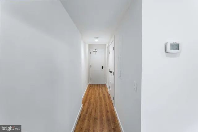 a close view of laundry room with a washer and dryer