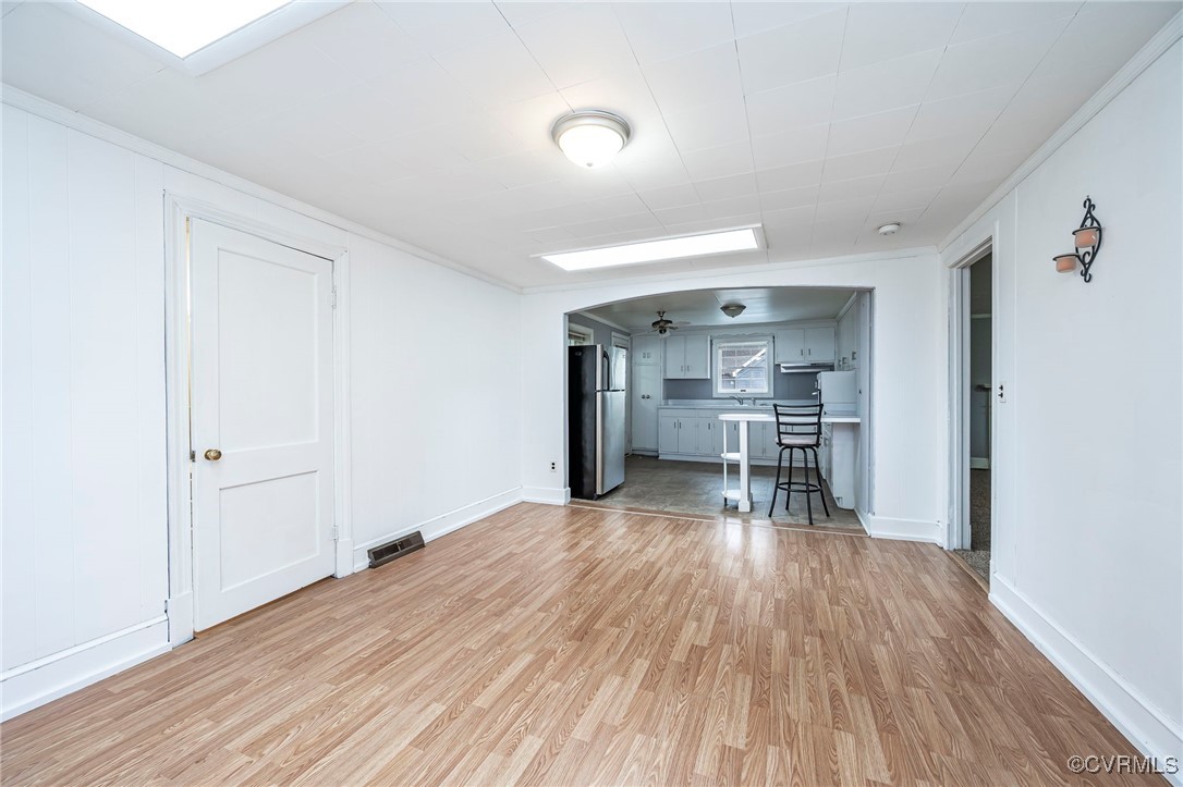 2100 Mt Landing Road Tappahannock, VA 22560 - Photo 11 of 31 Unfurnished living room with light hardwood / wood