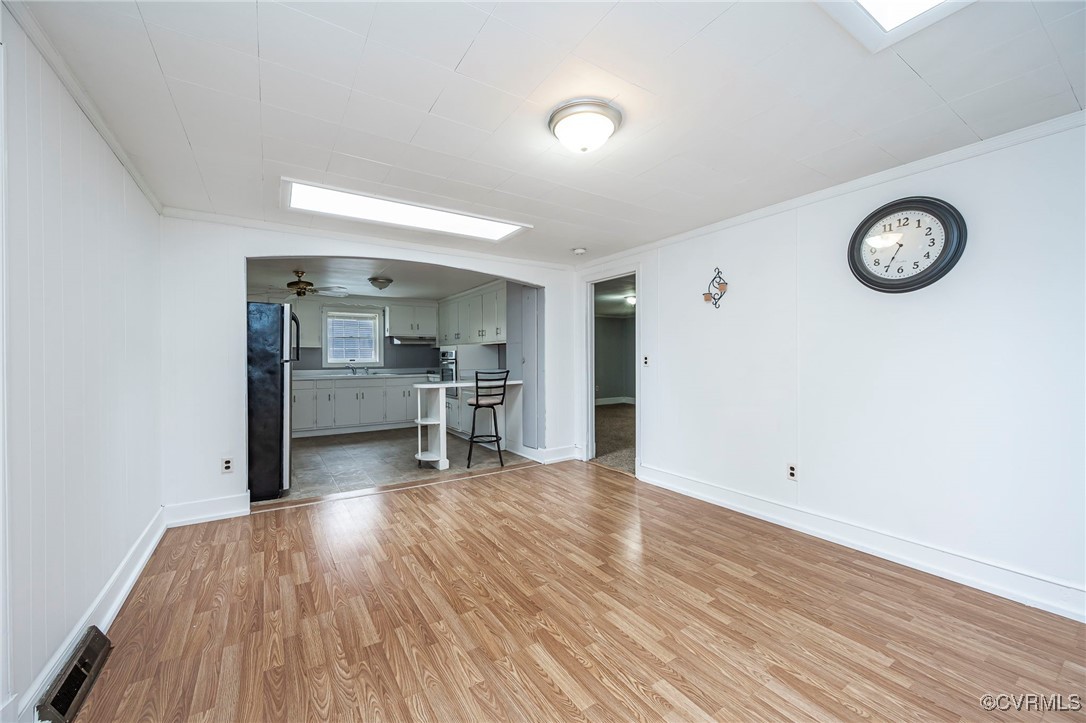 2100 Mt Landing Road Tappahannock, VA 22560 - Photo 12 of 31 Unfurnished living room featuring light wood-type