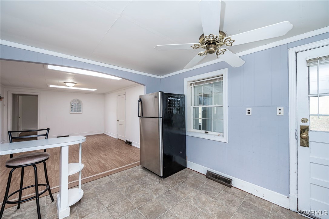 2100 Mt Landing Road Tappahannock, VA 22560 - Photo 15 of 31 Kitchen featuring ceiling fan, stainless steel fri