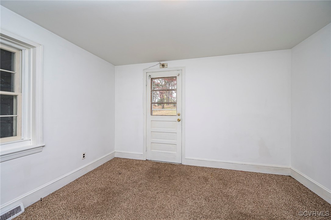 2100 Mt Landing Road Tappahannock, VA 22560 - Photo 17 of 31 Spare room with carpet