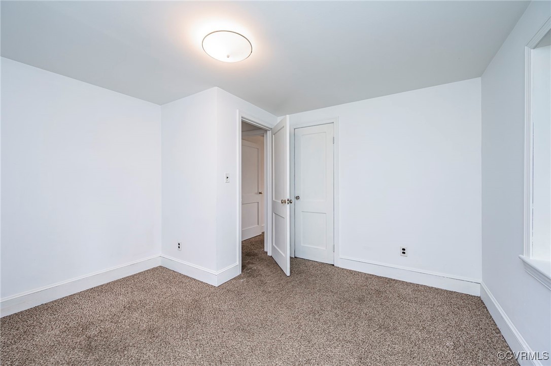 2100 Mt Landing Road Tappahannock, VA 22560 - Photo 18 of 31 Empty room with carpet flooring