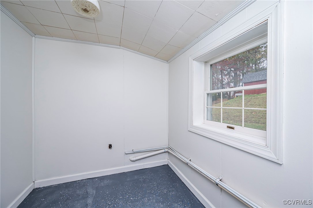 2100 Mt Landing Road Tappahannock, VA 22560 - Photo 23 of 31 Spare room featuring lofted ceiling and ornamental