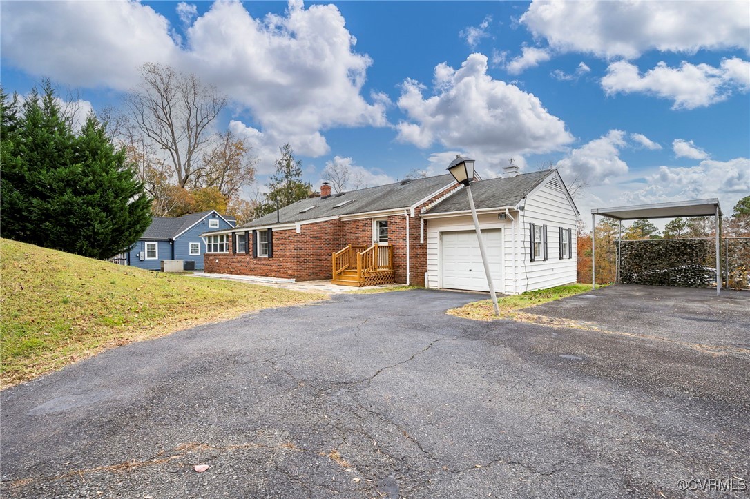 2100 Mt Landing Road Tappahannock, VA 22560 - Photo 27 of 31 View of front facade with a front yard and a carpo