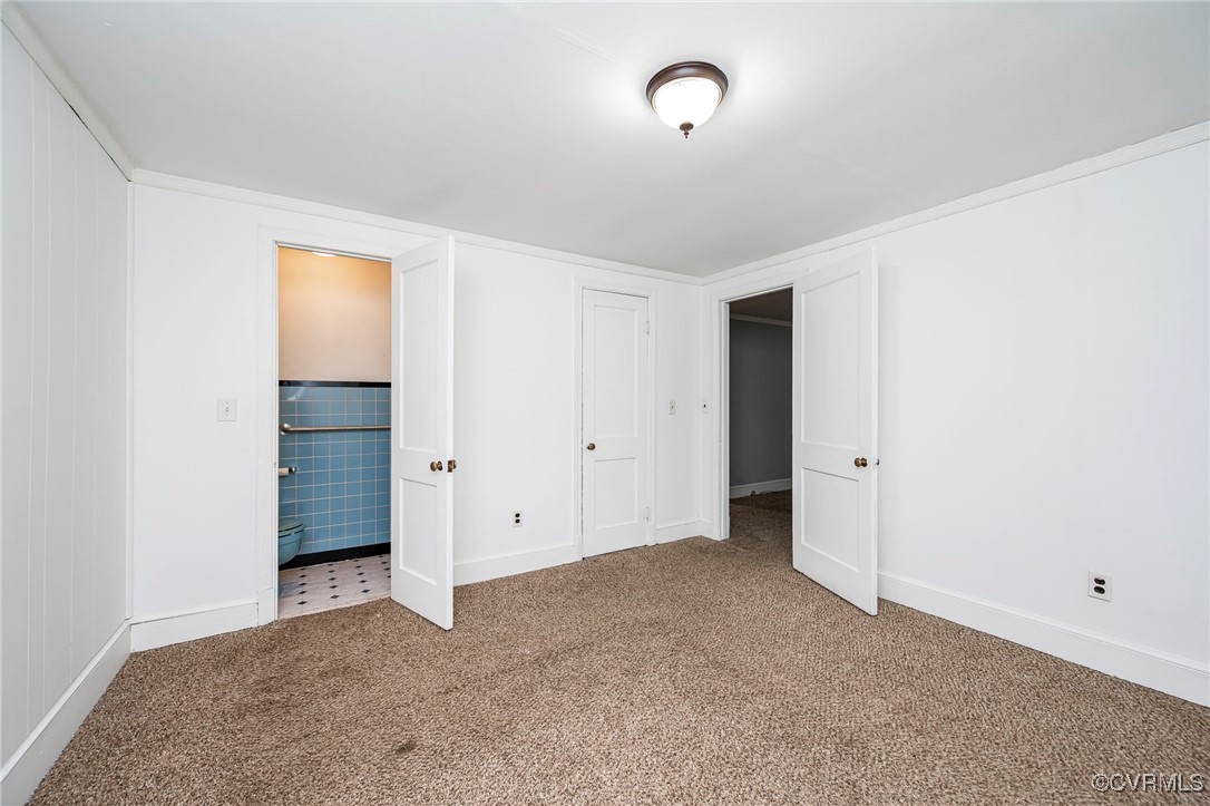 2100 Mt Landing Road Tappahannock, VA 22560 - Photo 8 of 31 Unfurnished bedroom featuring carpet floors and ti