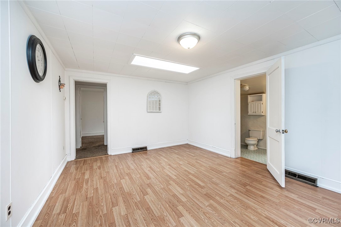 2100 Mt Landing Road Tappahannock, VA 22560 - Photo 10 of 31 Empty room with light wood-type flooring