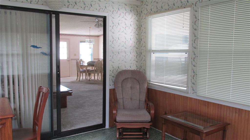 253 Ramsgate Way Haines City, FL 33844 - Photo 11 of 21 a room with window and wooden floor