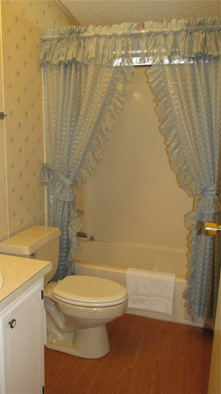 253 Ramsgate Way Haines City, FL 33844 - Photo 15 of 21 a bathroom with a toilet and a shower