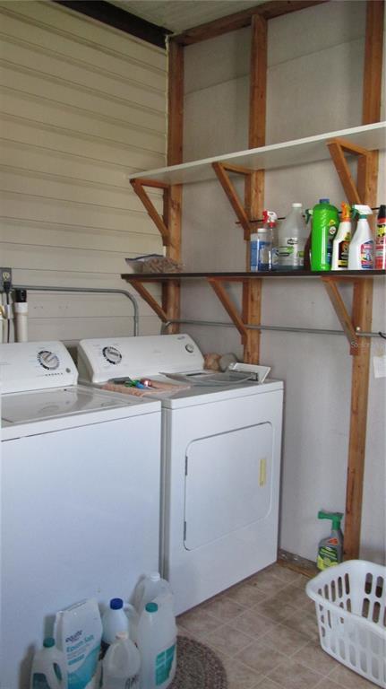 253 Ramsgate Way Haines City, FL 33844 - Photo 20 of 21 a utility room with dryer and washer